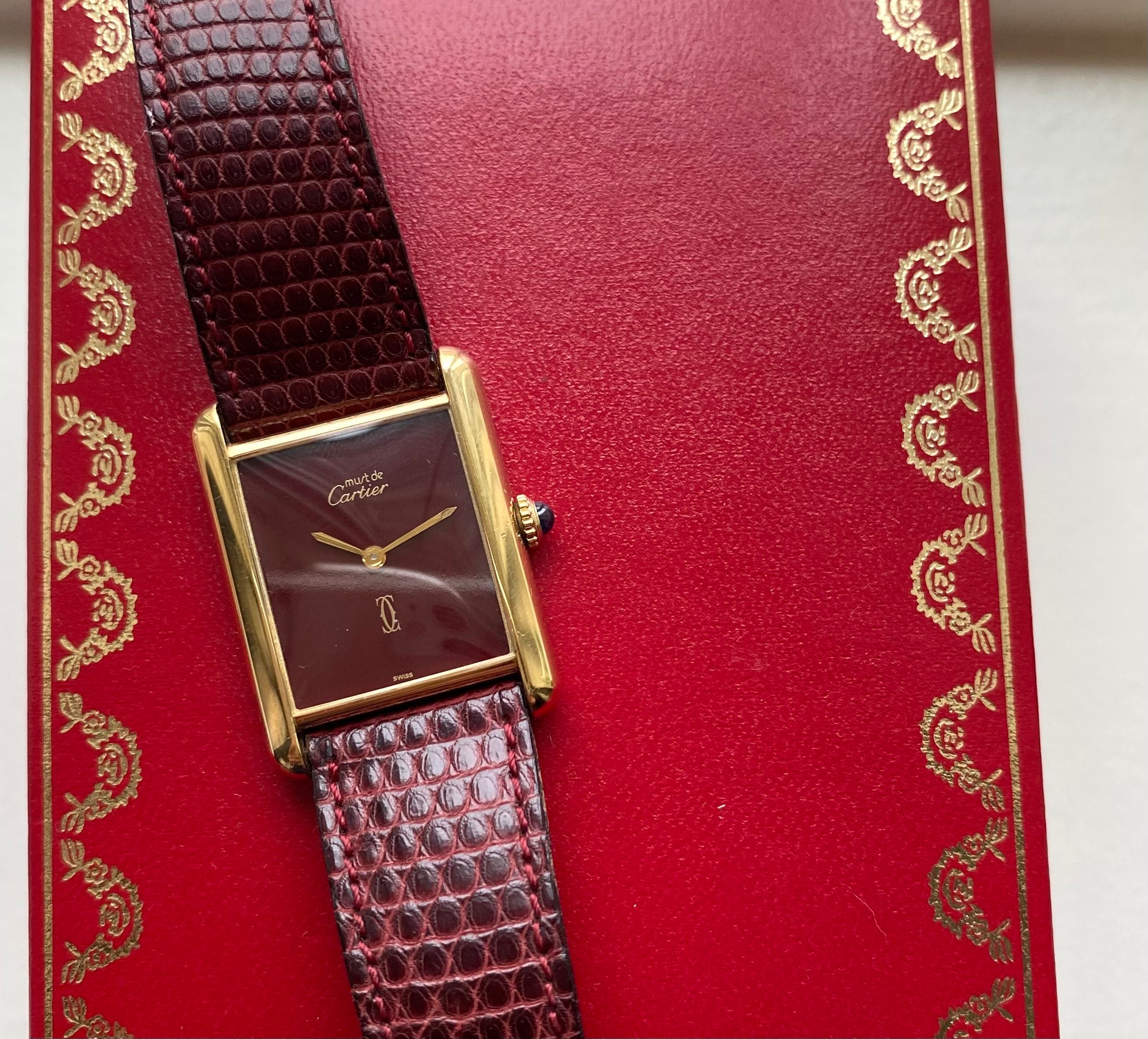 Cartier Tank — Maroon Dial