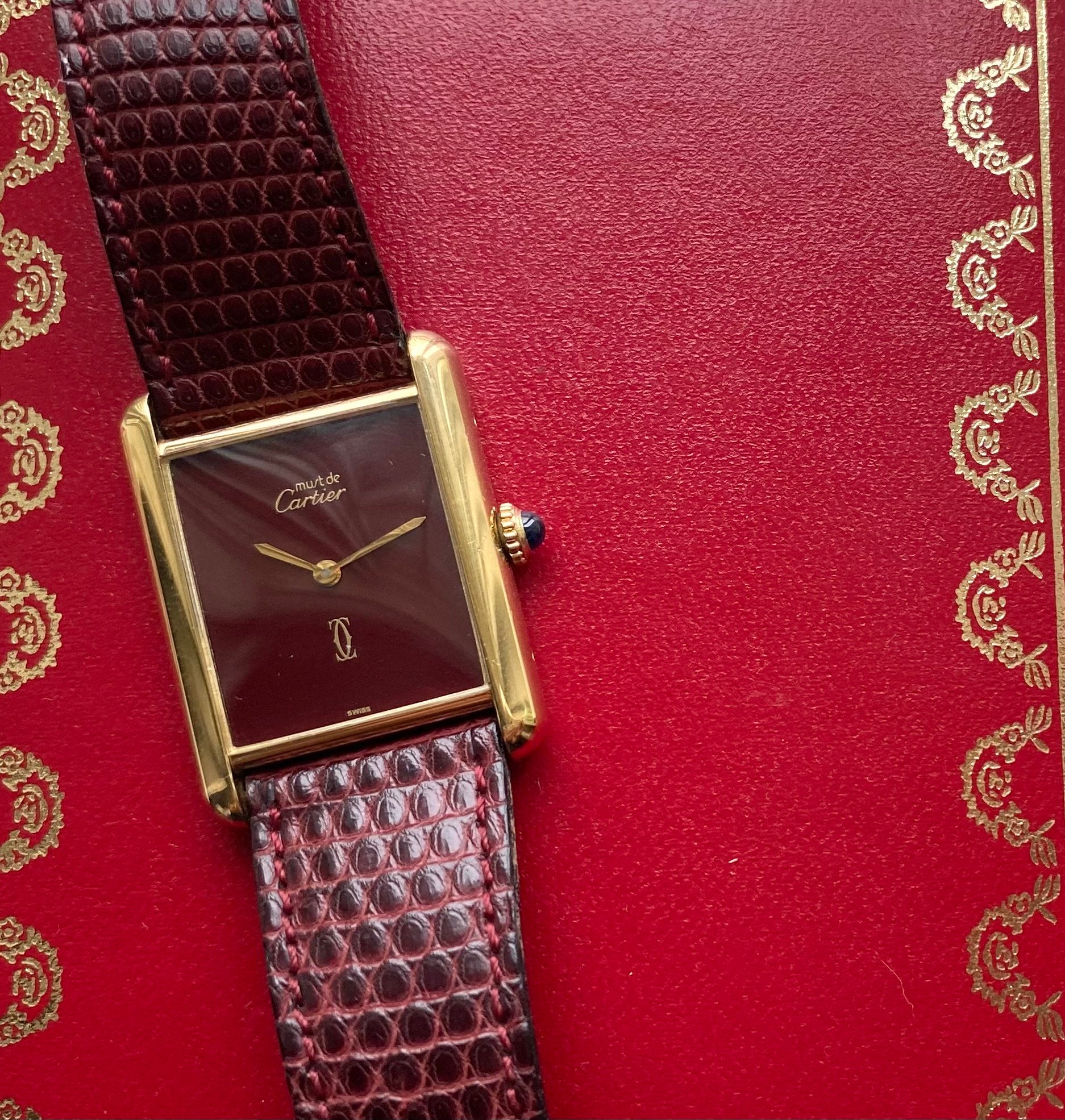 Cartier Tank — Maroon Dial