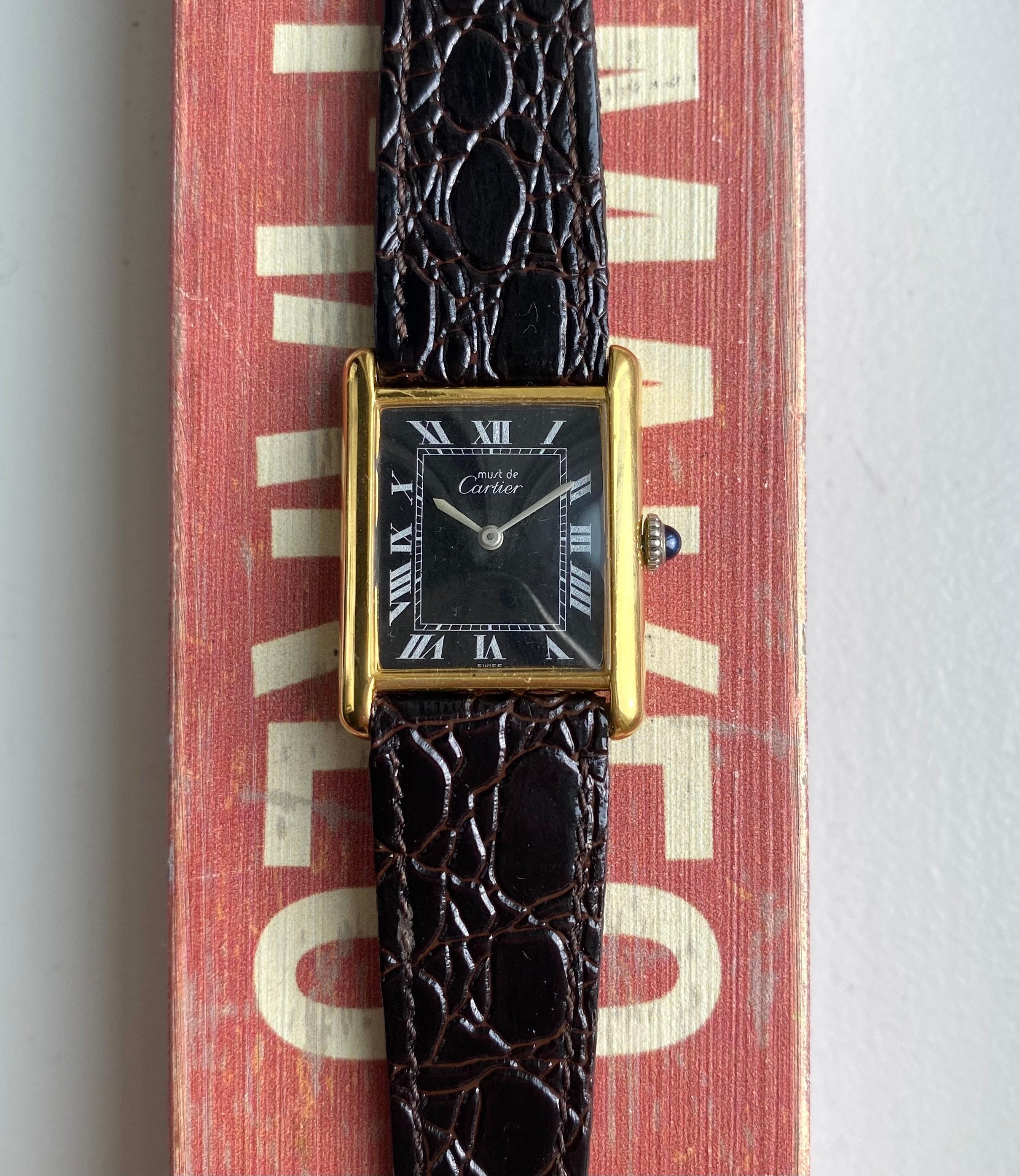 Cartier Tank — Black Roman Numeral Dial