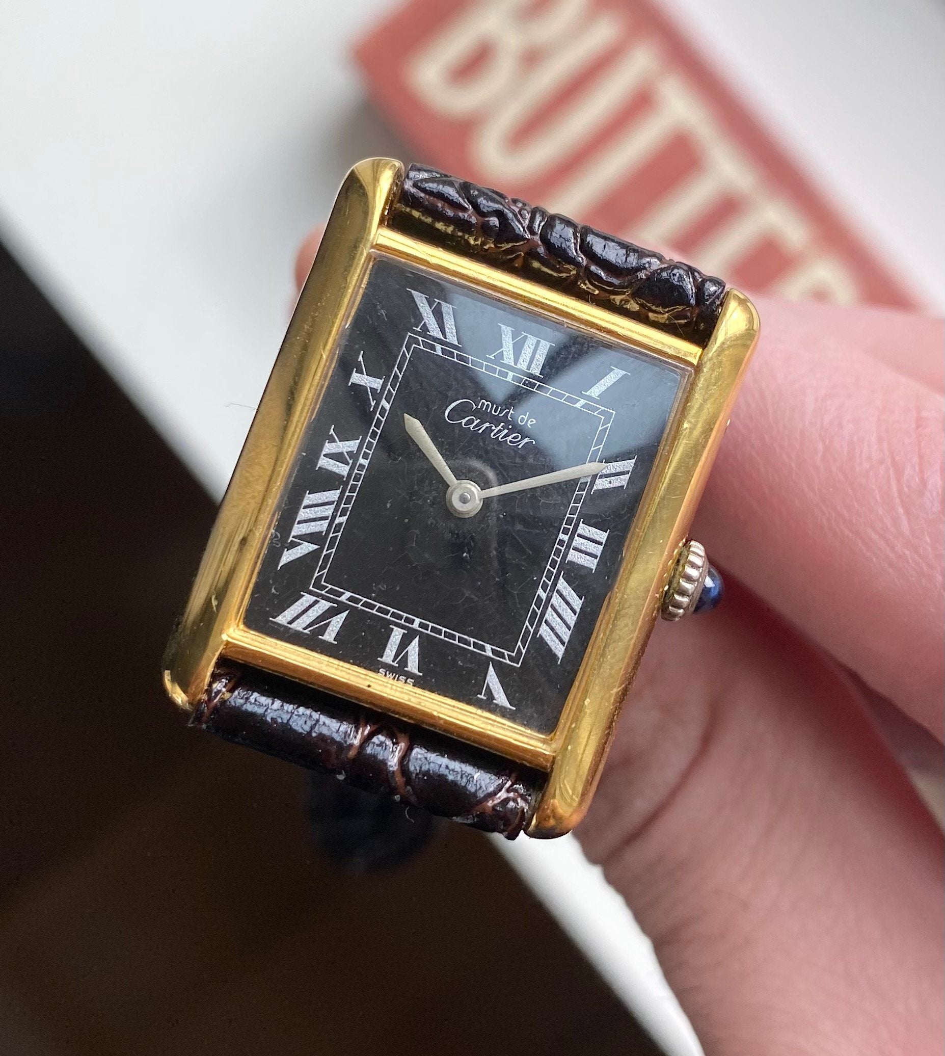 Cartier Tank — Black Roman Numeral Dial