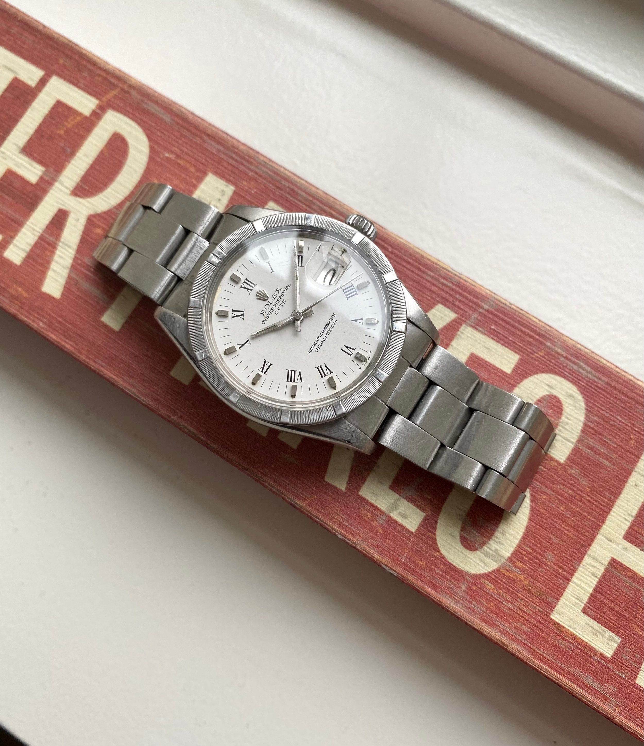 Rolex Oyster Perpetual ref. 1501 — White Roman Numeral Dial