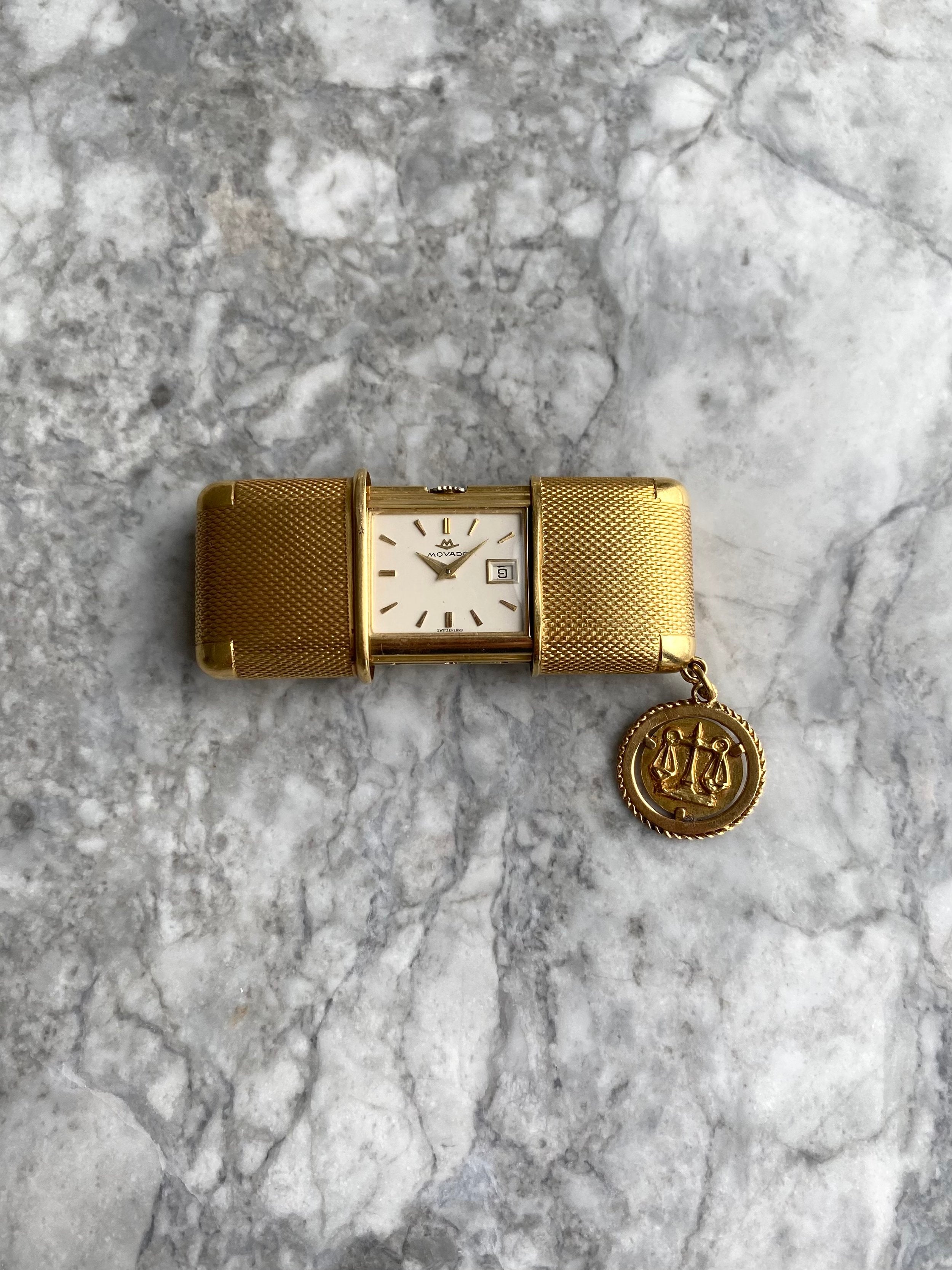 Movado Travel Clock - 18K Yellow Gold.