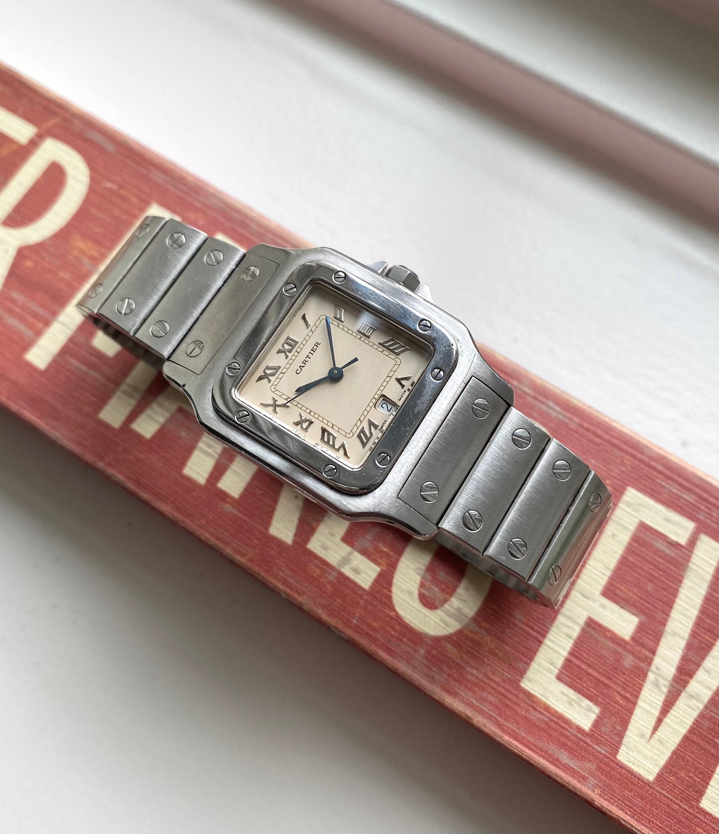 Cartier Santos — Cream Roman Numerals