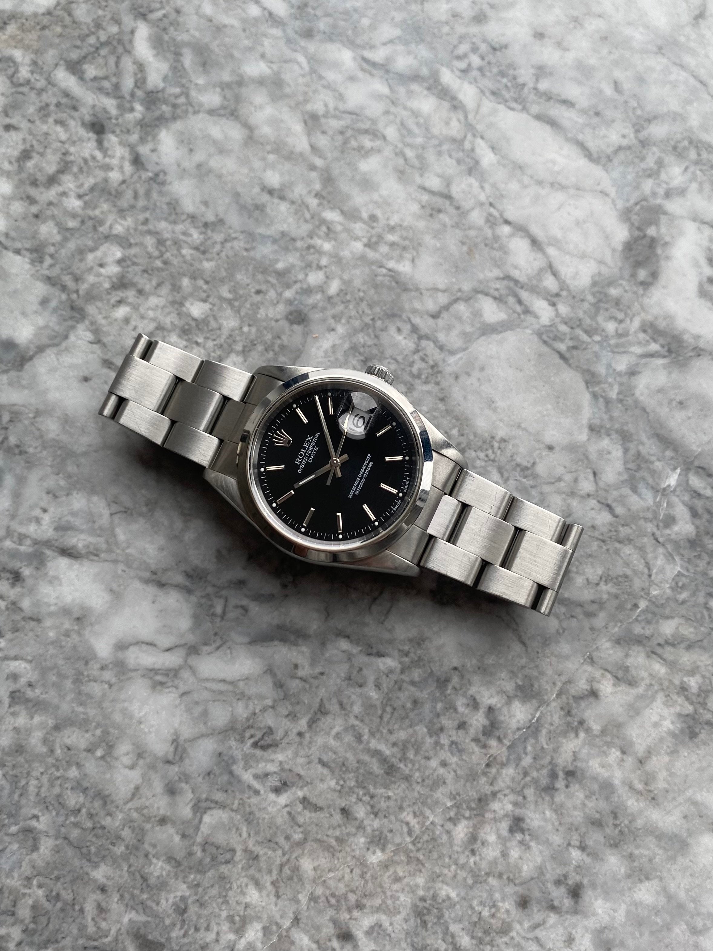 Rolex OP 15200 - Black Dial.