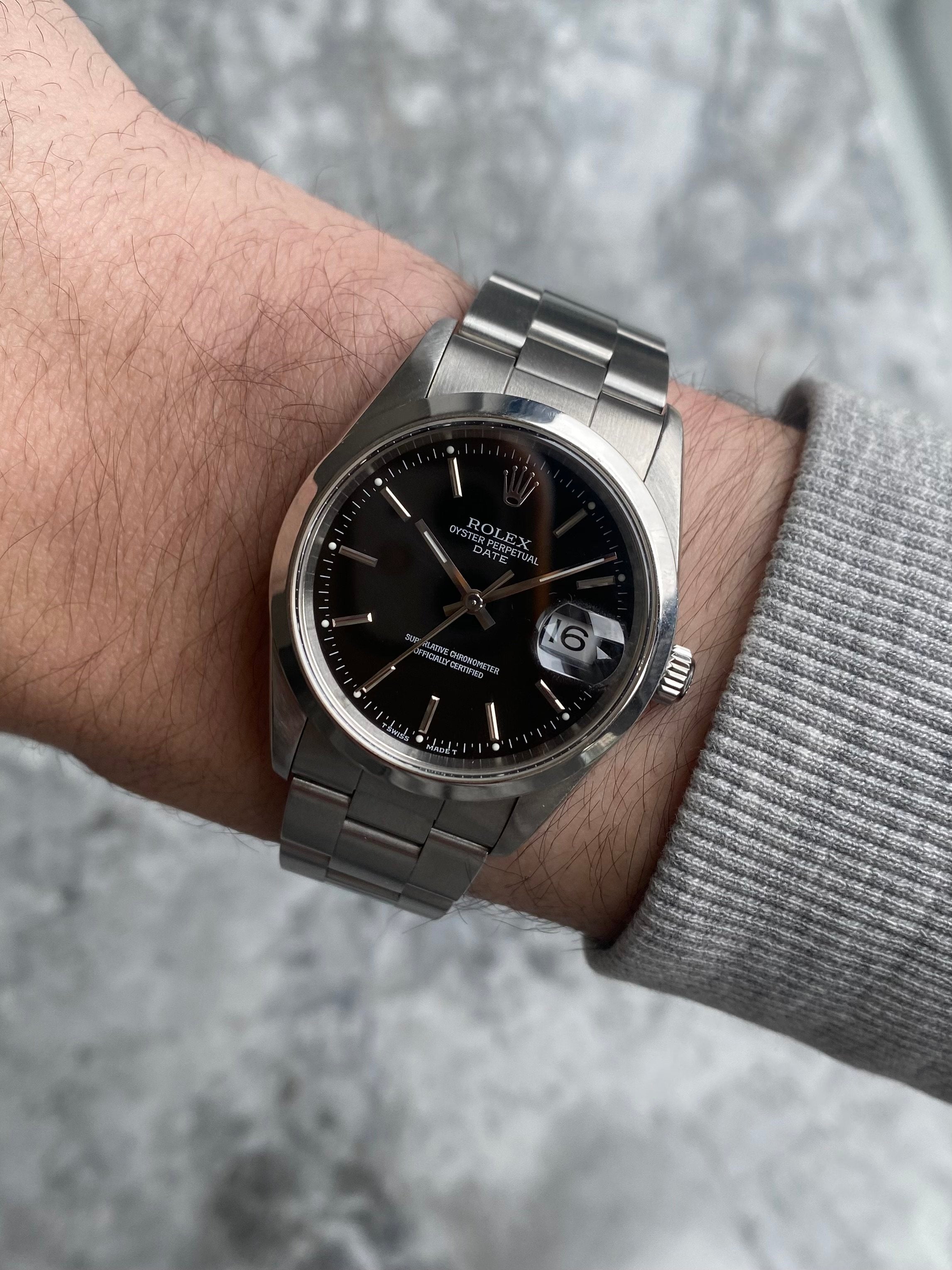 Rolex OP 15200 - Black Dial.