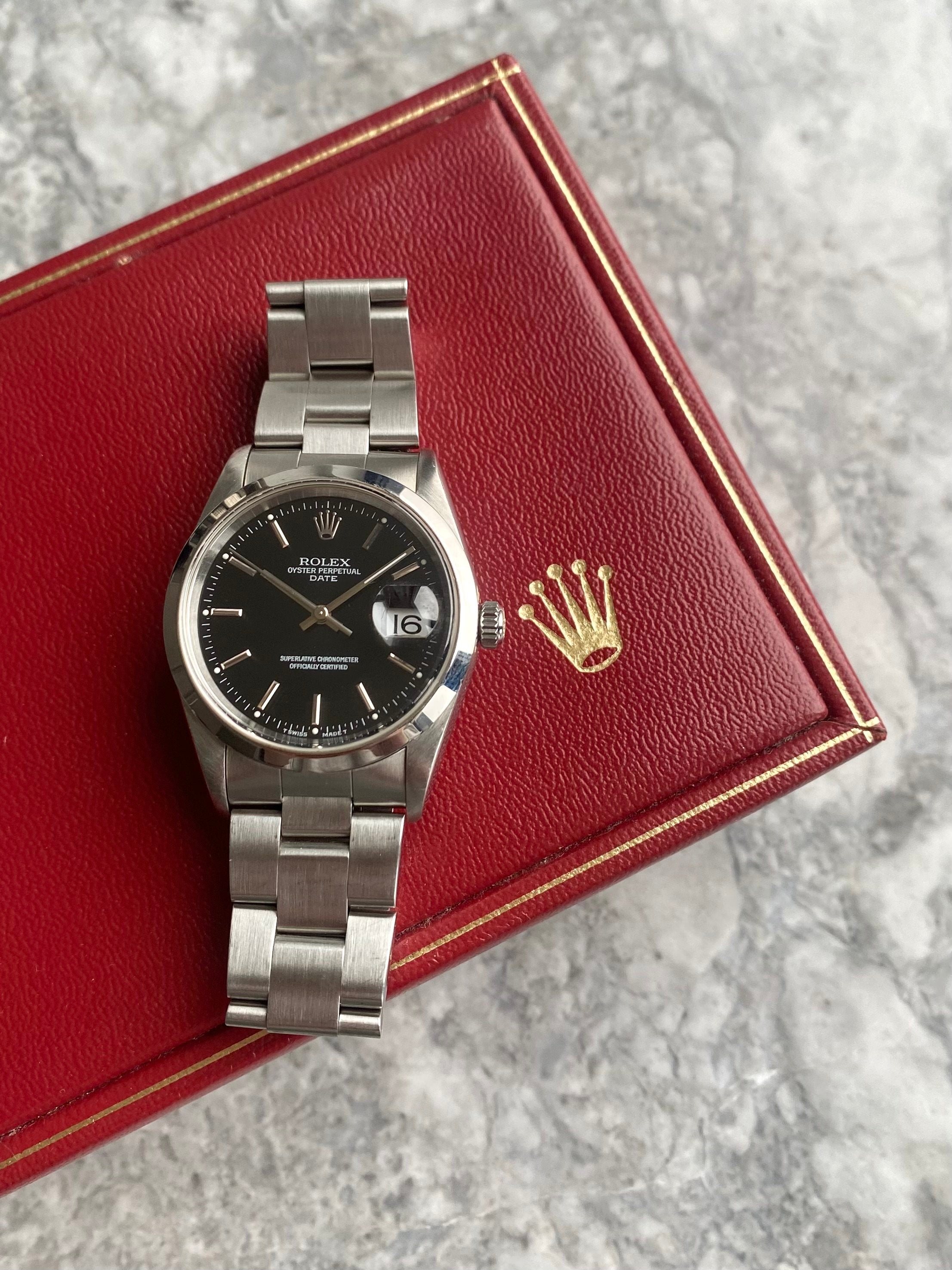 Rolex OP 15200 - Black Dial.