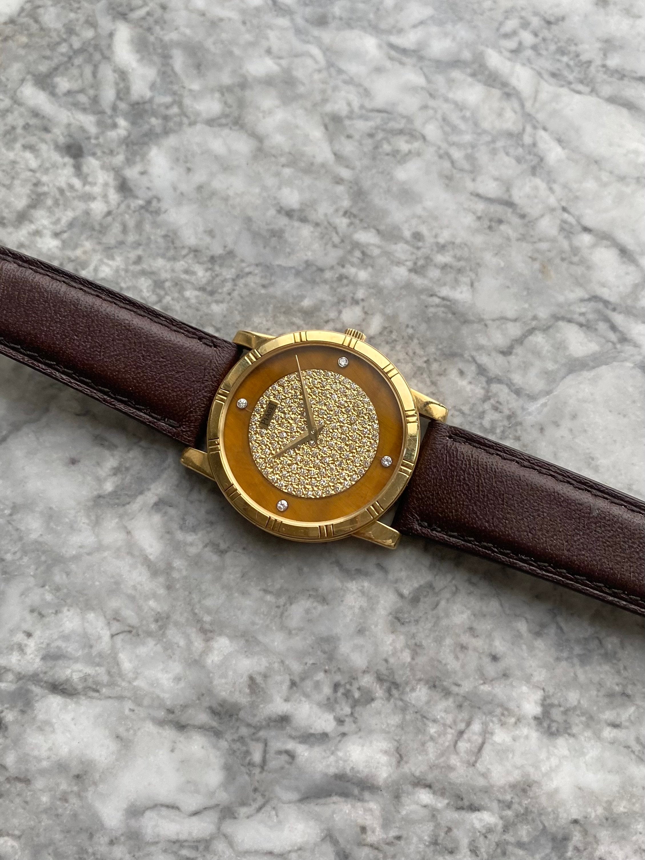 Piaget 18K Yellow Gold - Tiger Eye Diamond Dial.