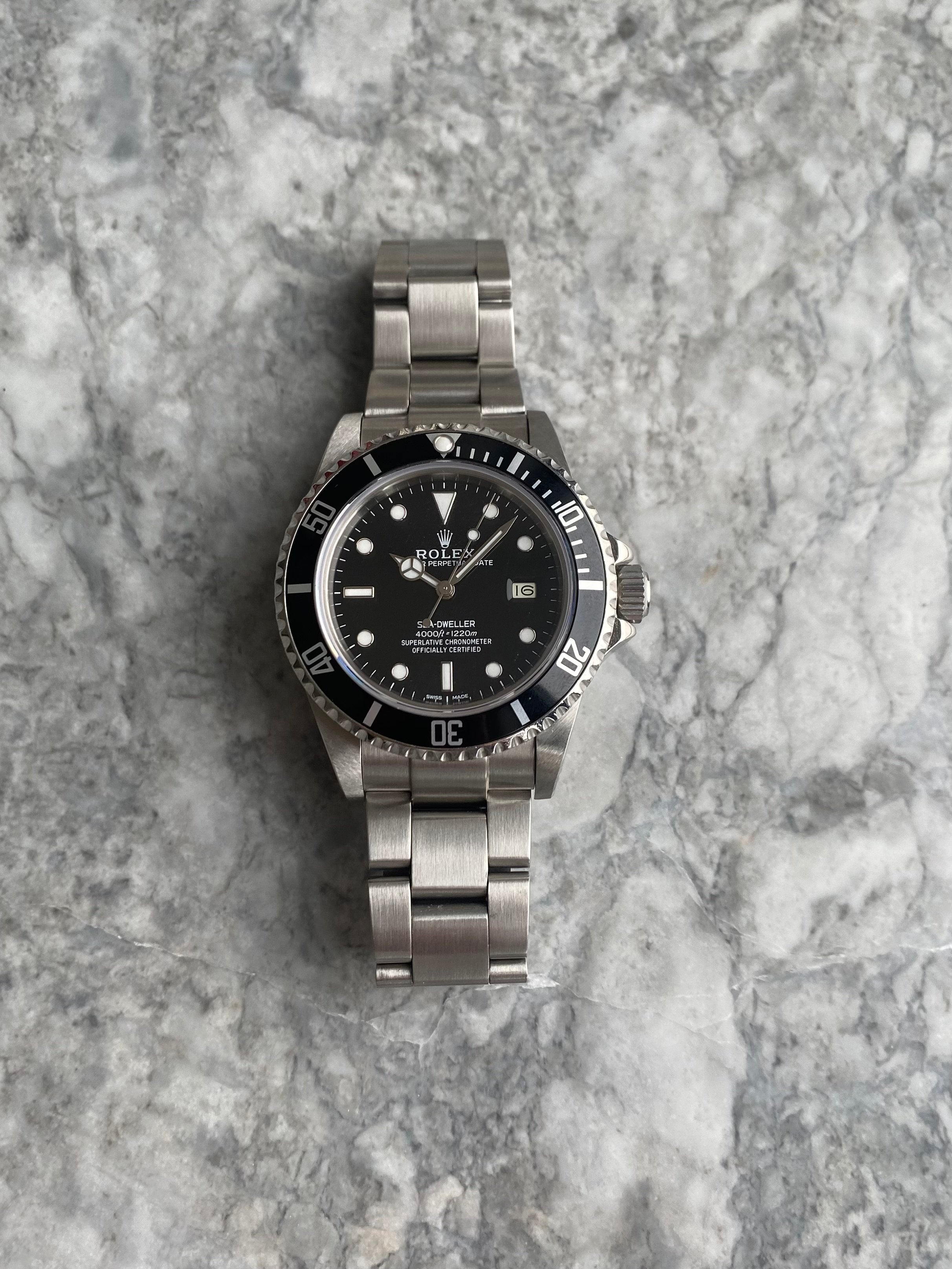 Rolex Seadweller M16660 - Service Card.