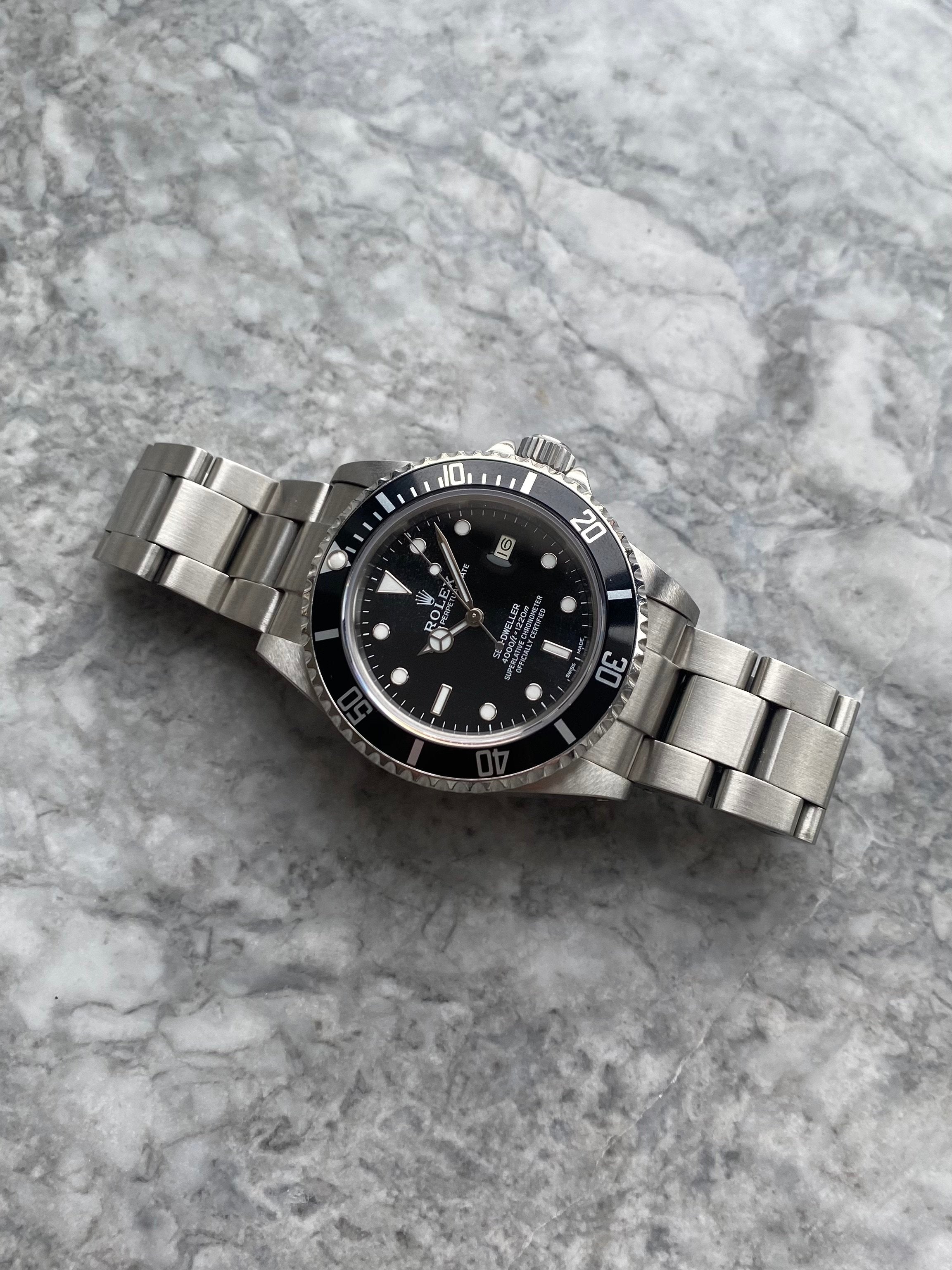 Rolex Seadweller M16660 - Service Card.