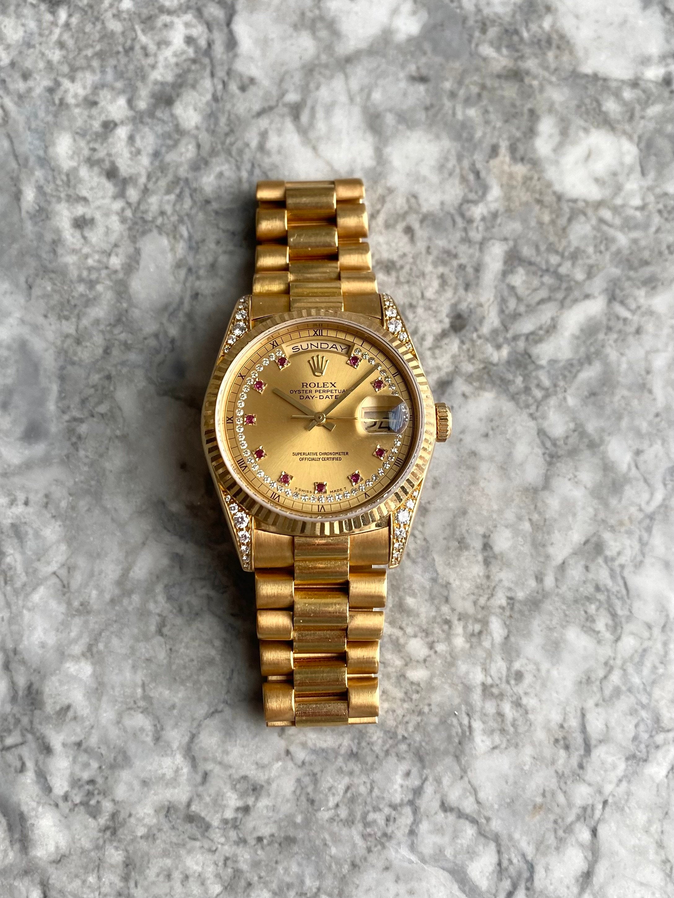 Rolex Daydate 18338 - Ruby Diamond Dial.