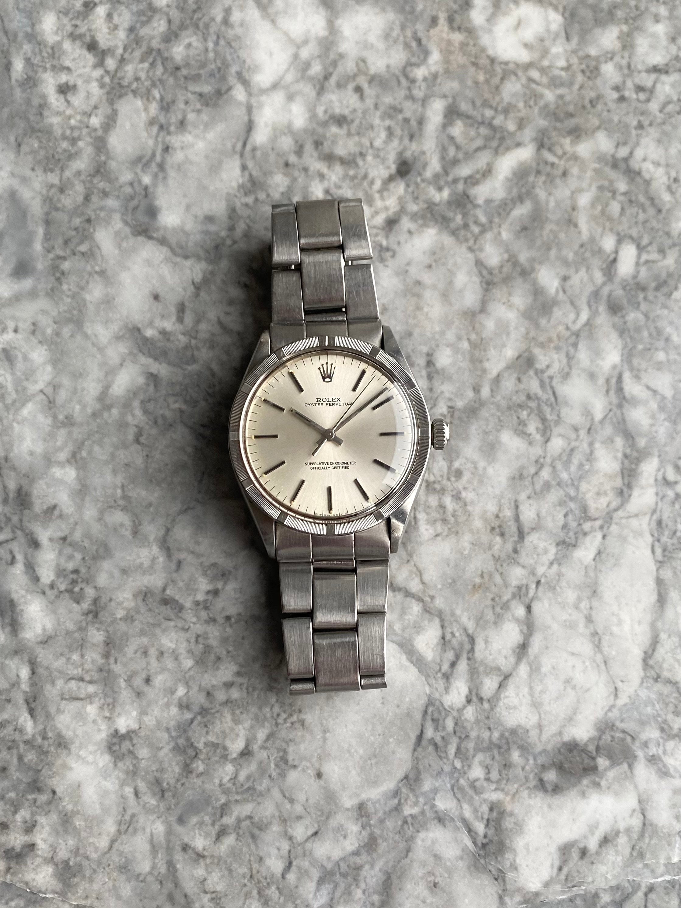 Rolex OP 1007 - Silver Sigma Dial w/ Papers.