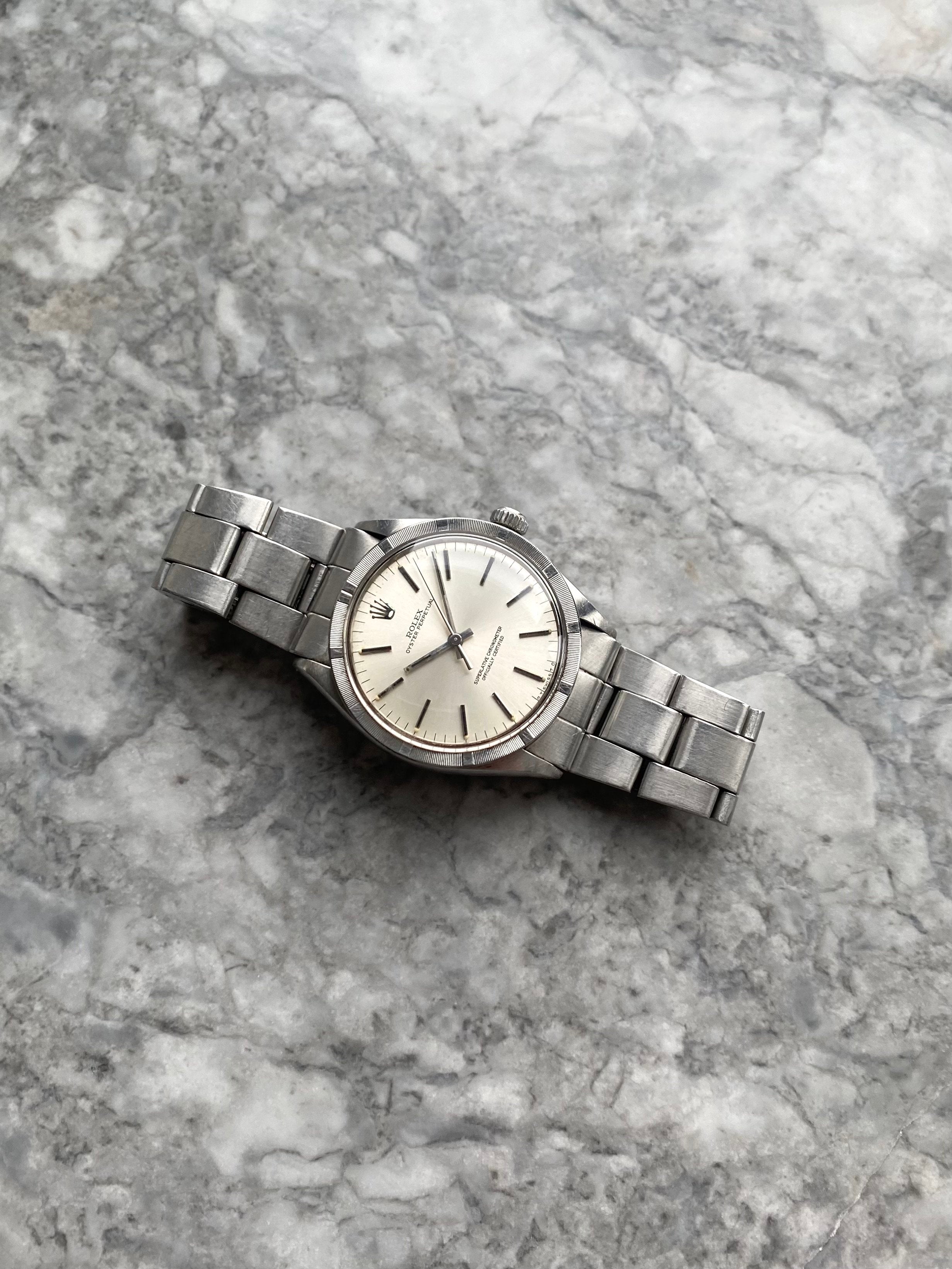 Rolex OP 1007 - Silver Sigma Dial w/ Papers.