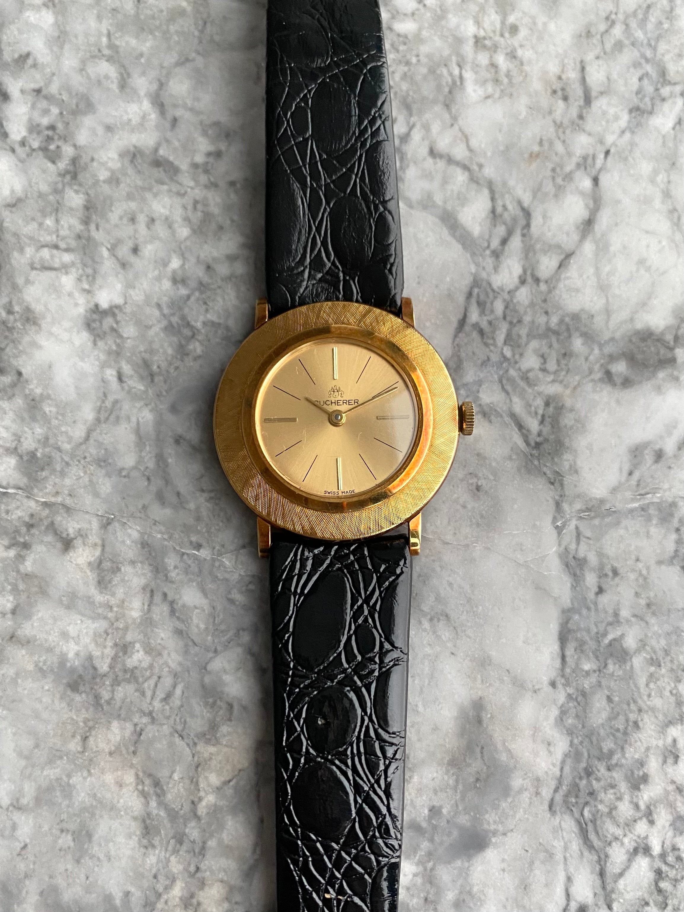 Bucherer - 18K Yellow Gold.