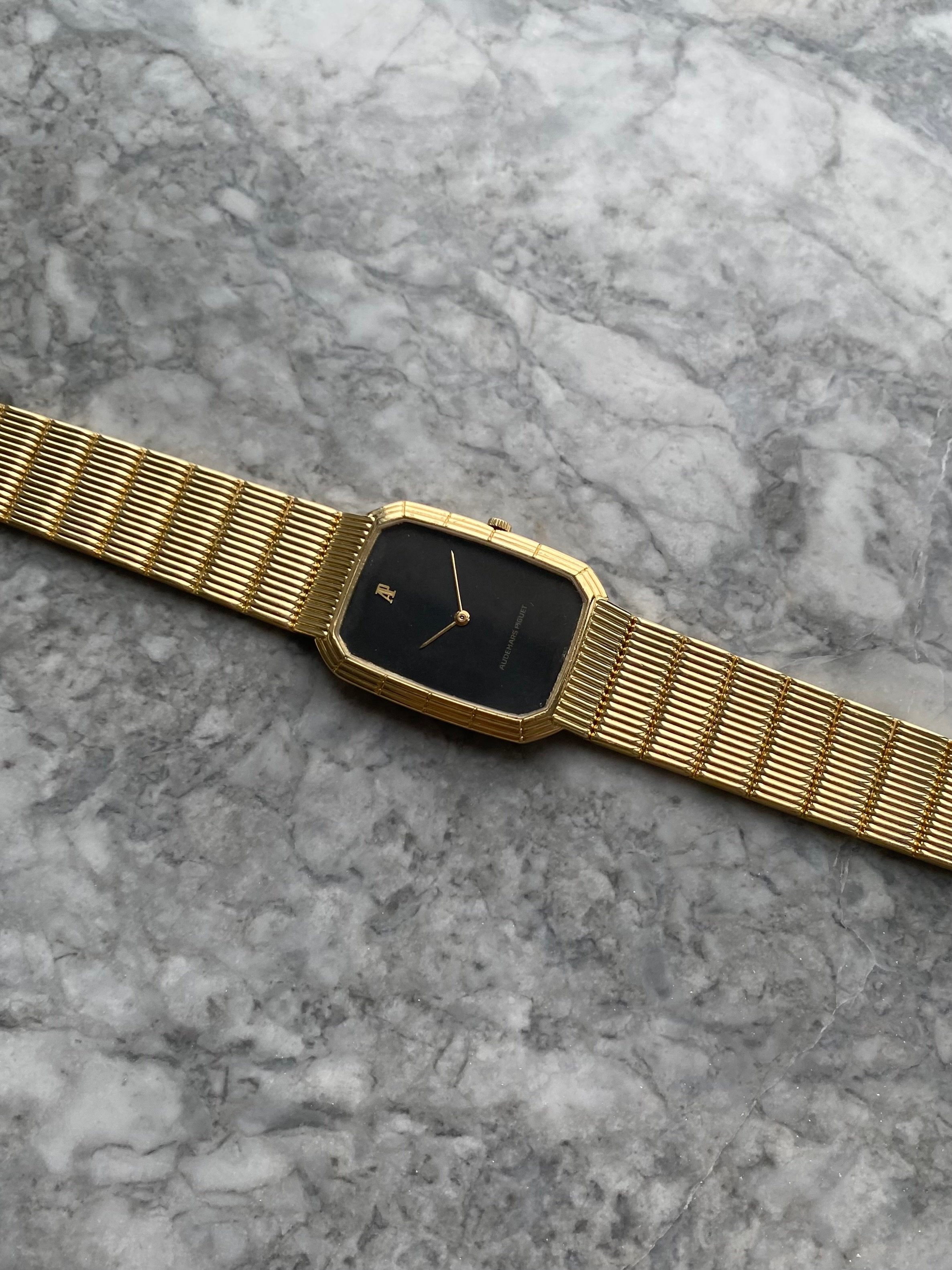 Audemars Piguet - 18K Yellow Gold.