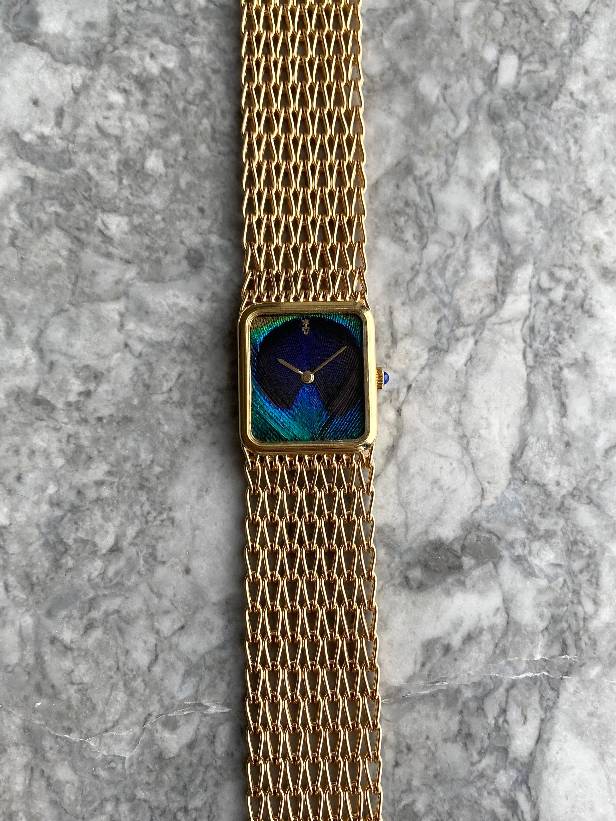 Corum Peacock 18K Gold - Box & Papers