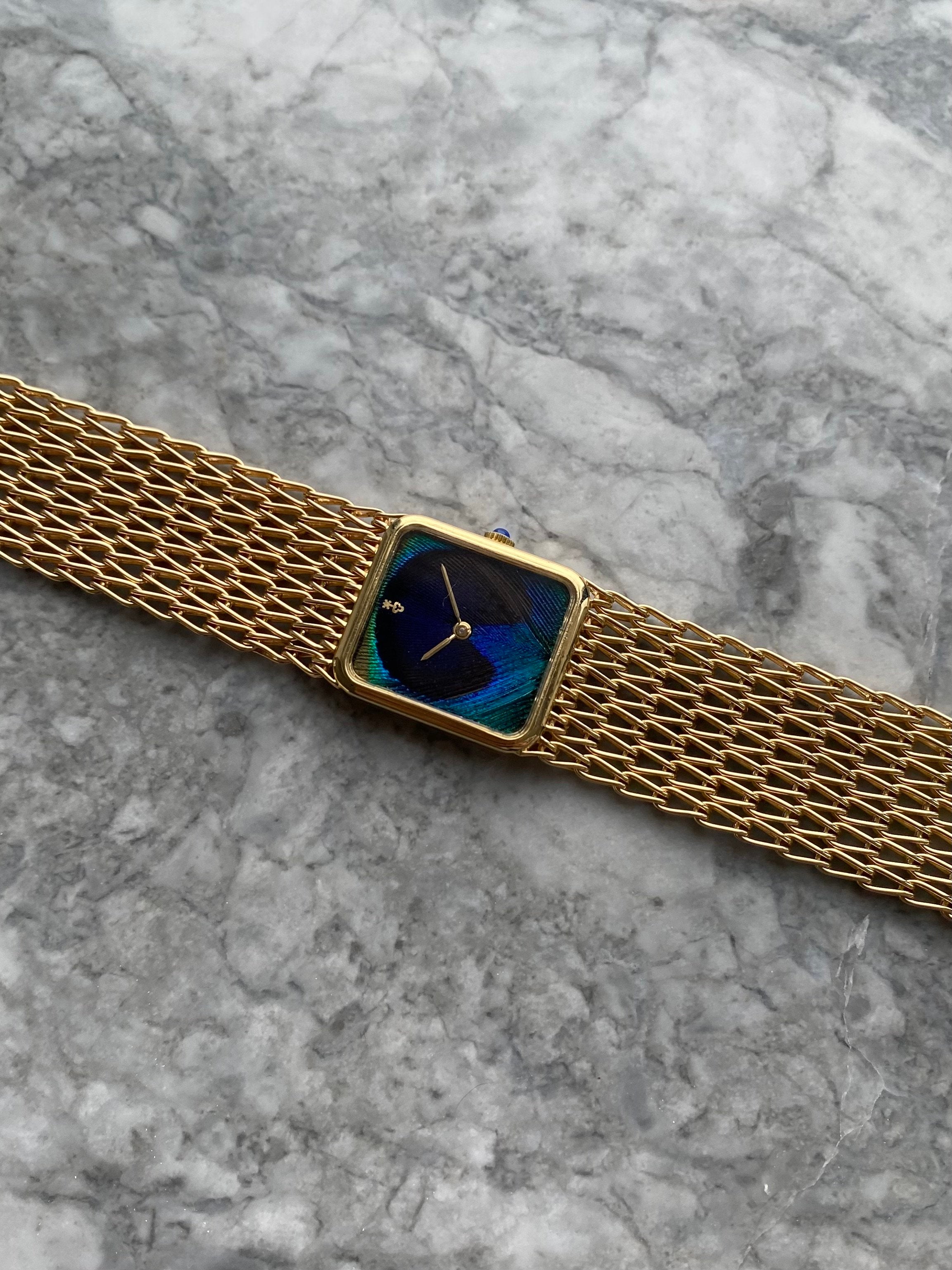 Corum Peacock 18K Gold - Box & Papers