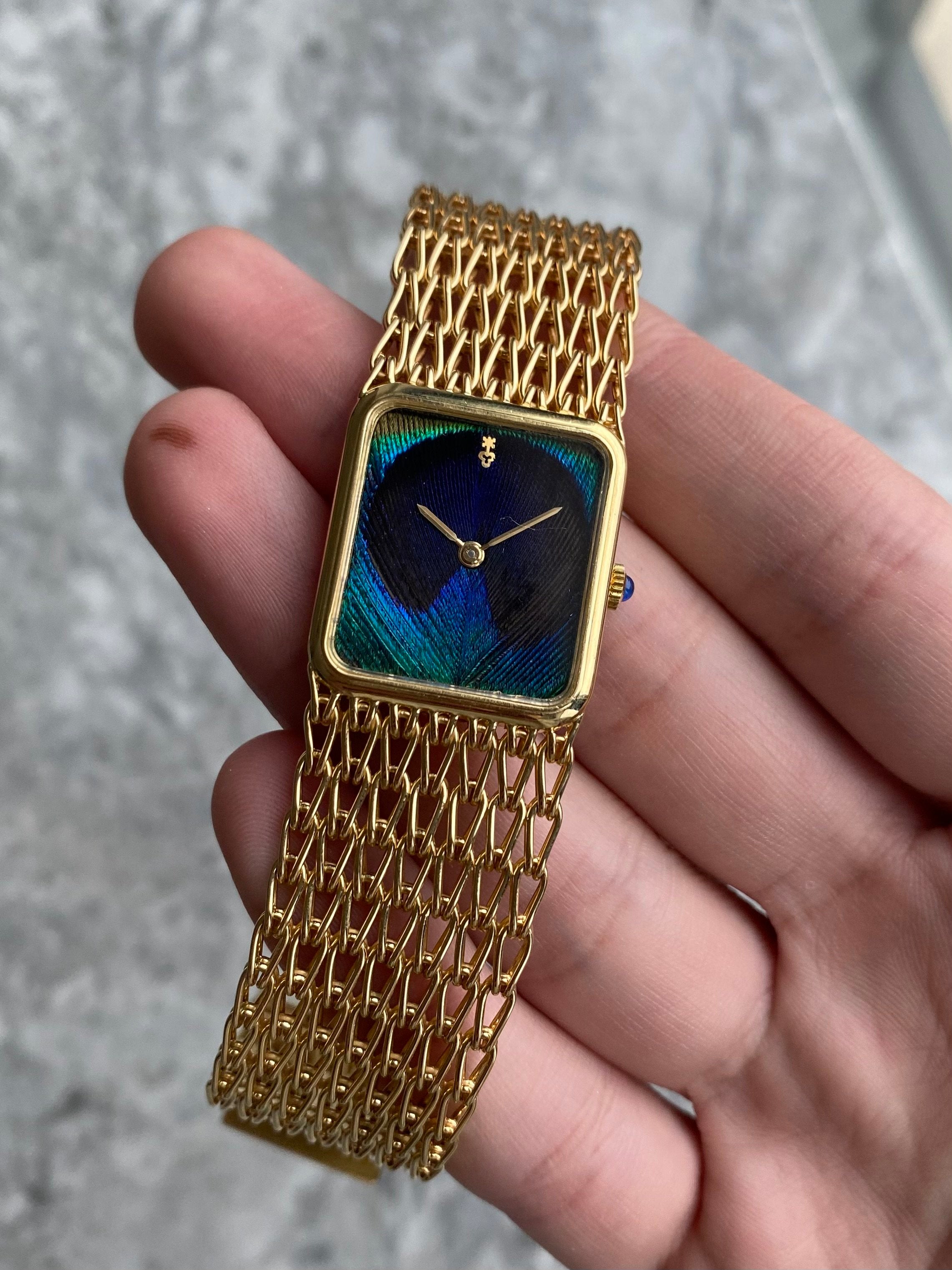 Corum Peacock 18K Gold - Box & Papers