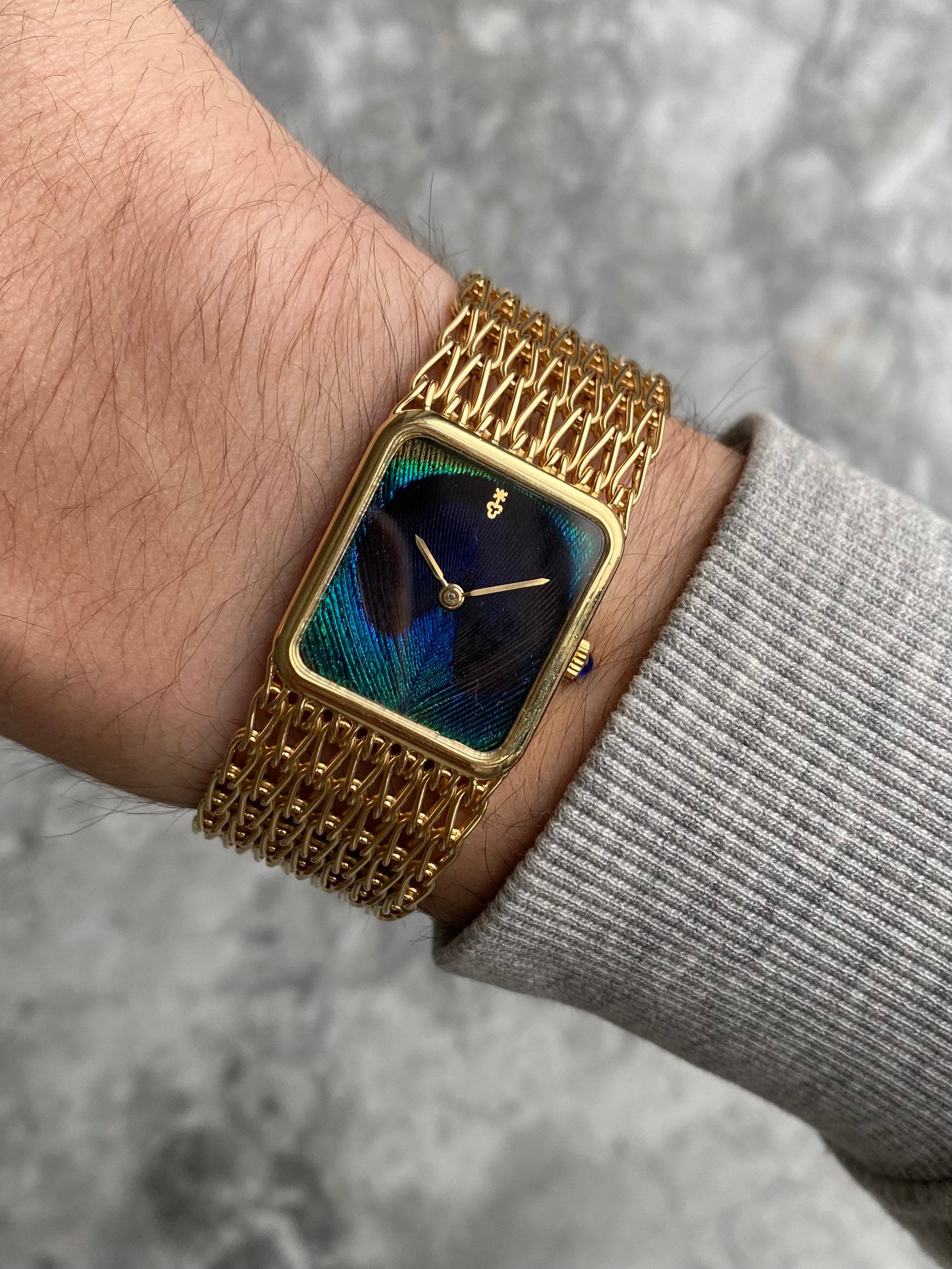 Corum Peacock 18K Gold - Box & Papers