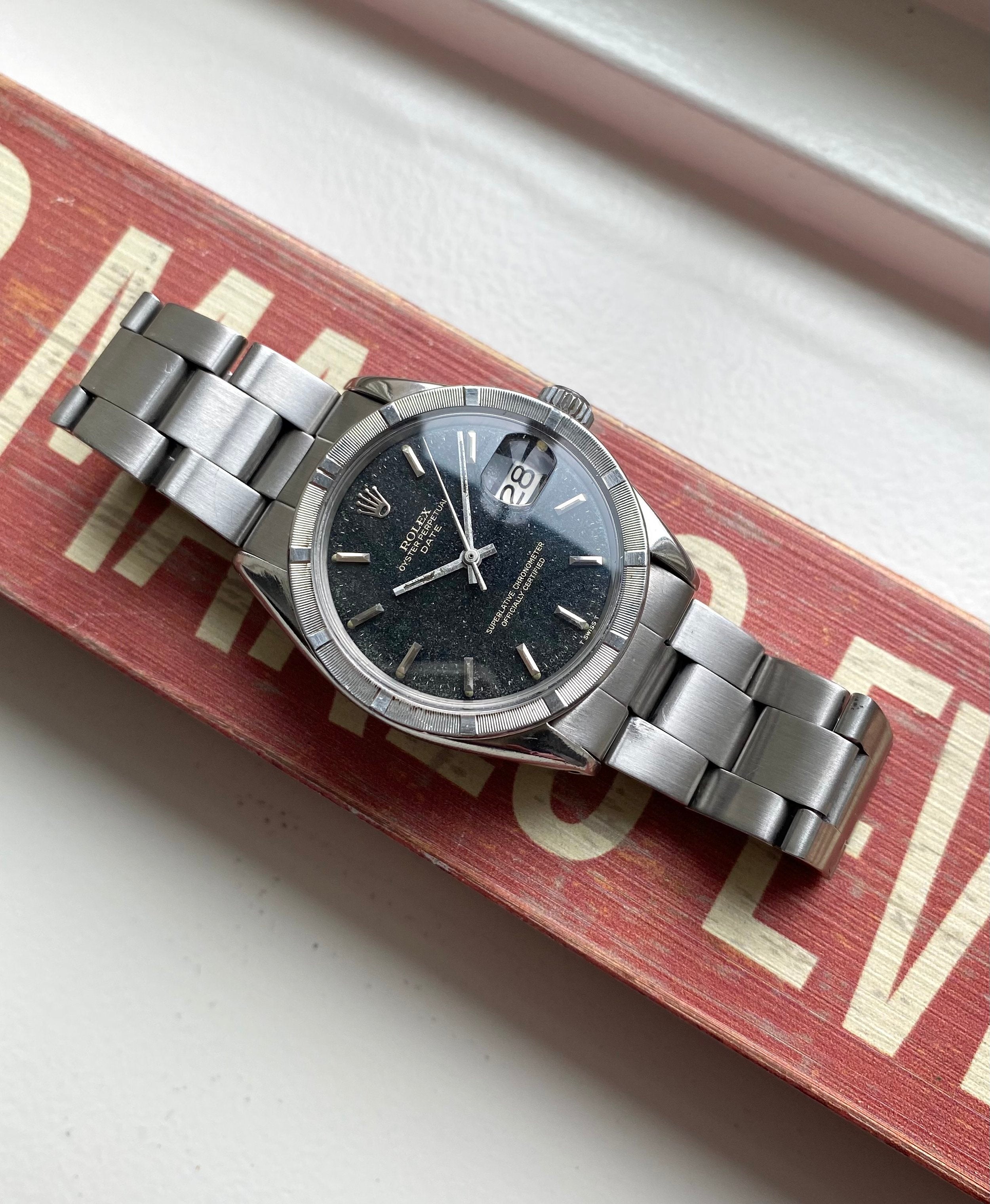 Rolex Oysterperpetual ref. 1501 — Black Gilt Dial