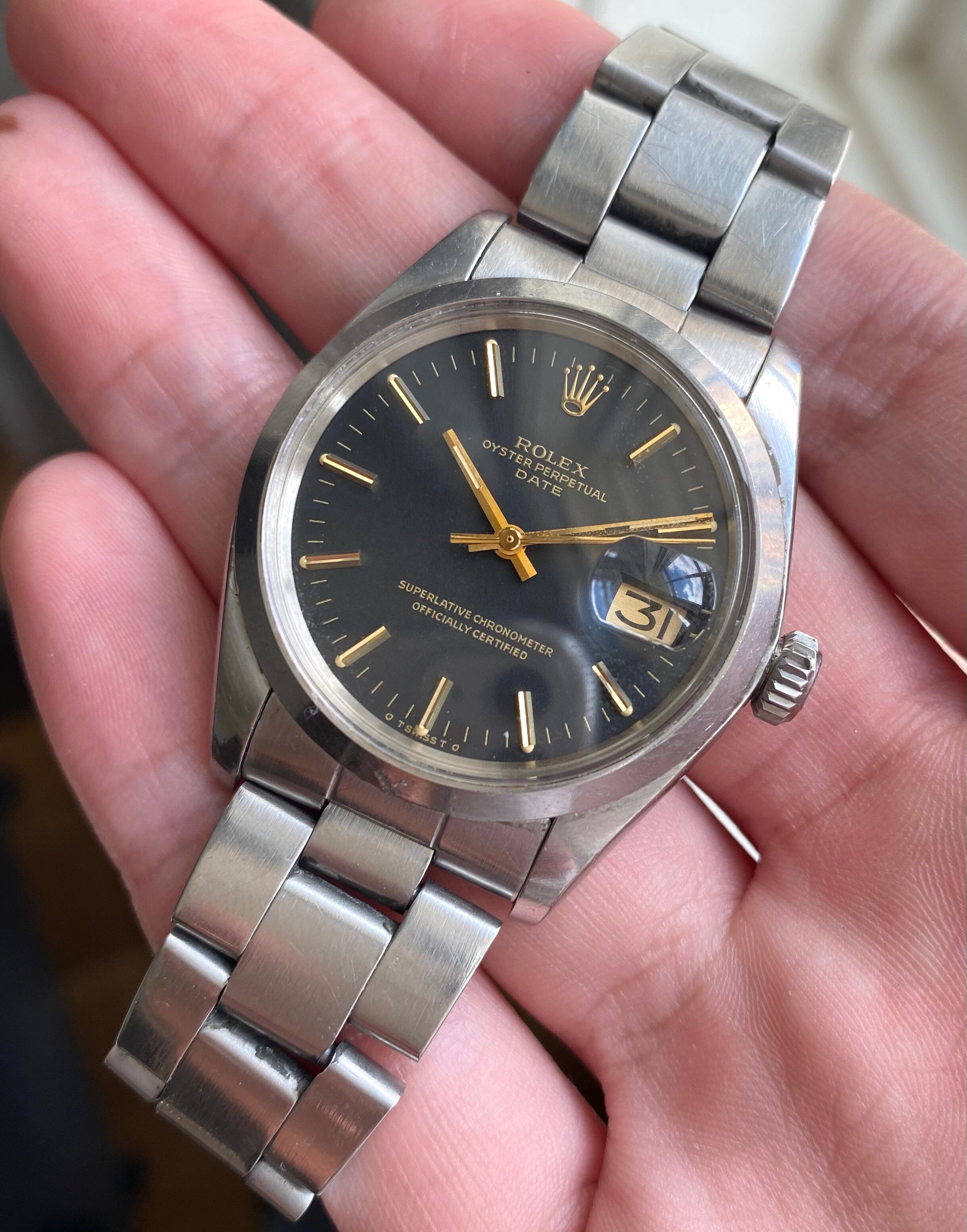 Rolex Oyster Perpetual Date ref. 1500 — Black Sigma Dial