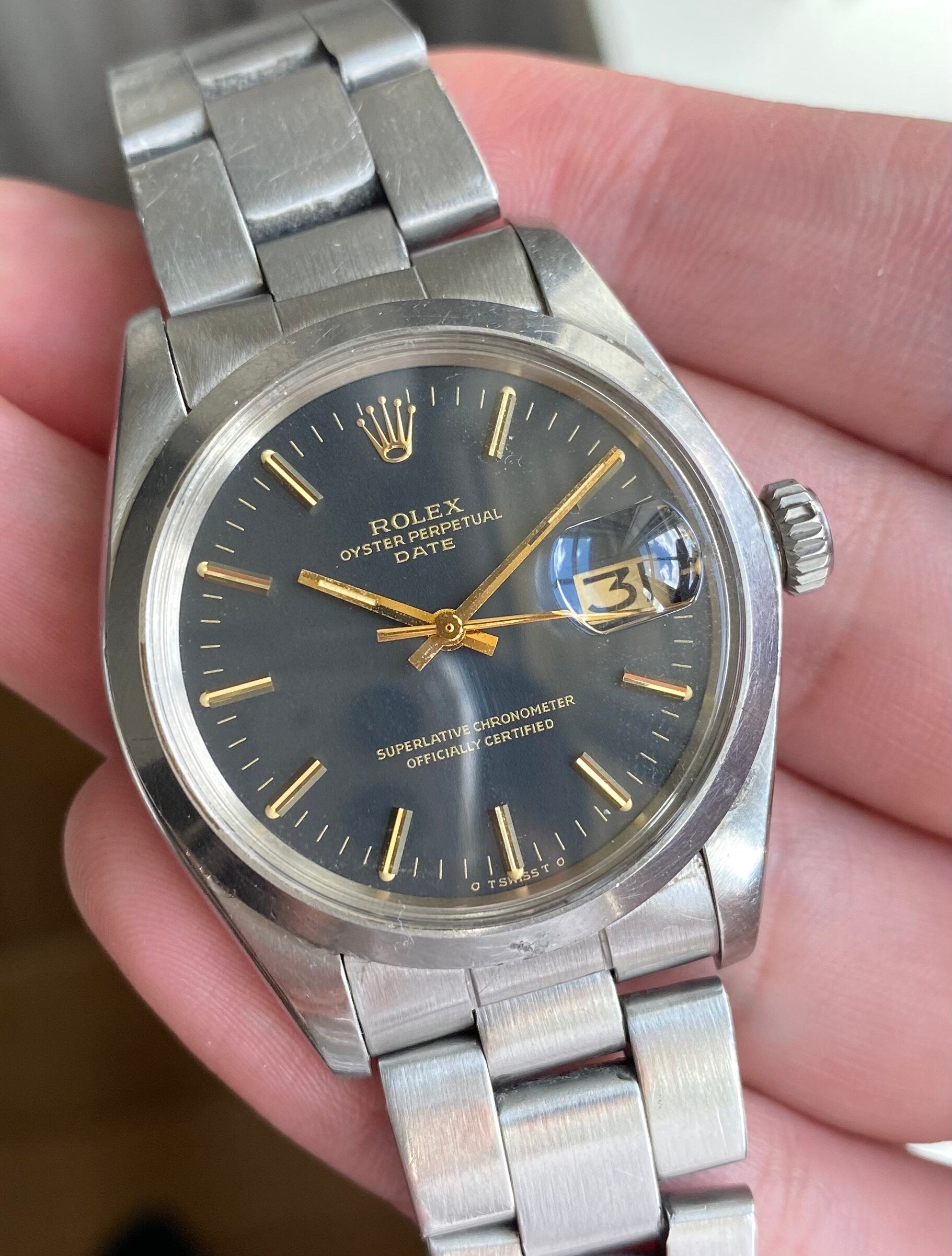 Rolex Oyster Perpetual Date ref. 1500 — Black Sigma Dial