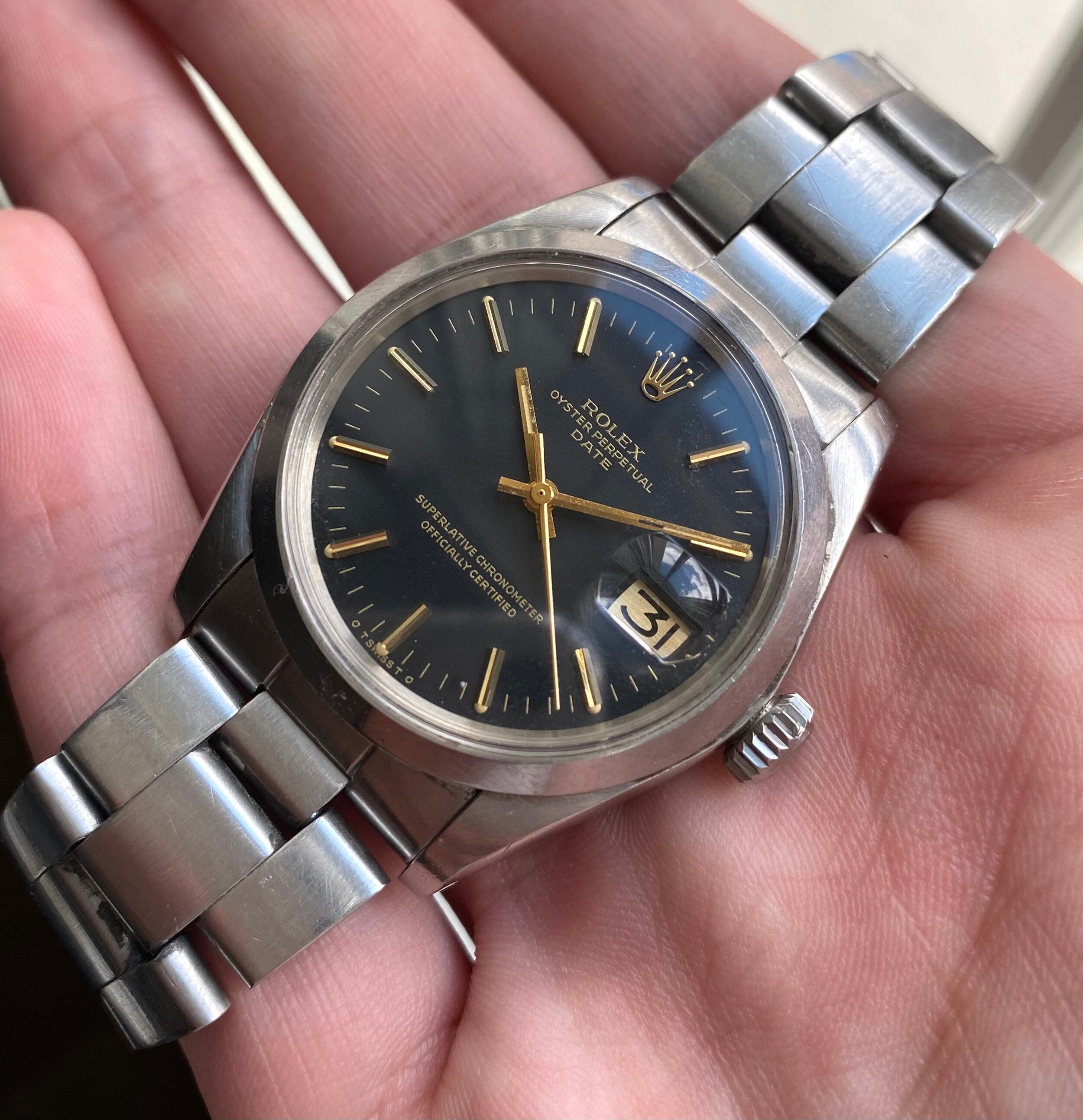 Rolex Oyster Perpetual Date ref. 1500 — Black Sigma Dial