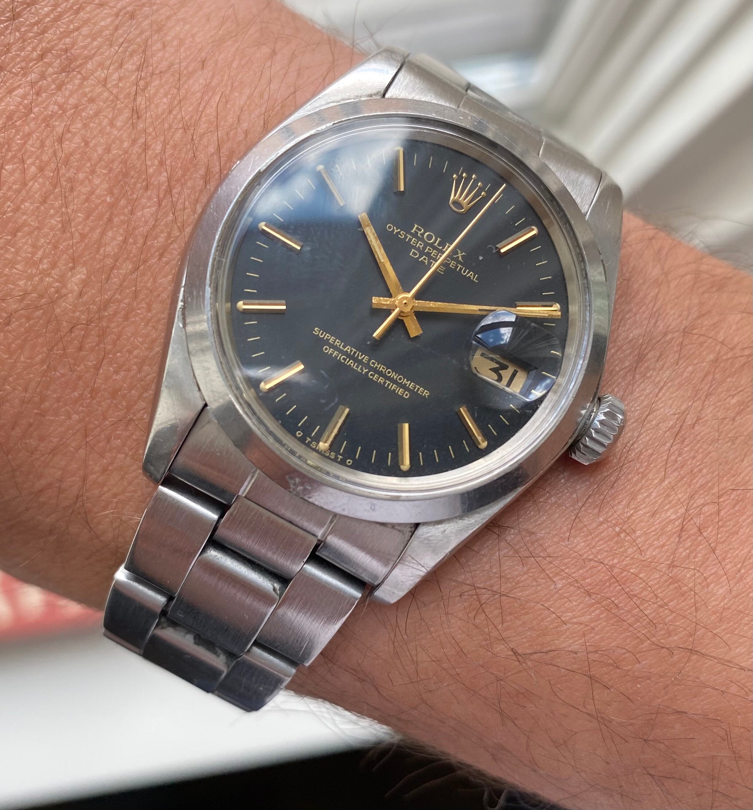 Rolex Oyster Perpetual Date ref. 1500 — Black Sigma Dial