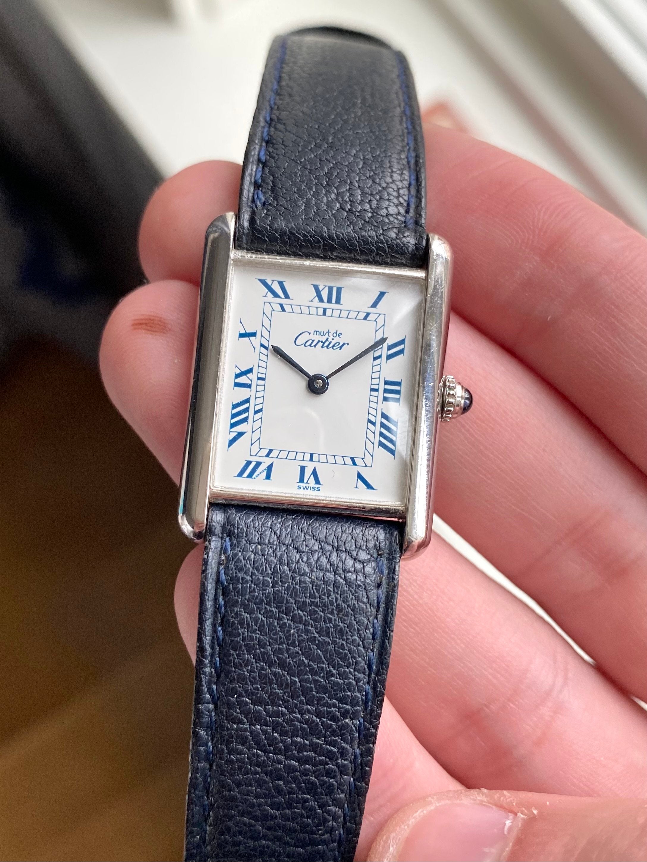 Cartier Tank — White Roman Numeral Dial