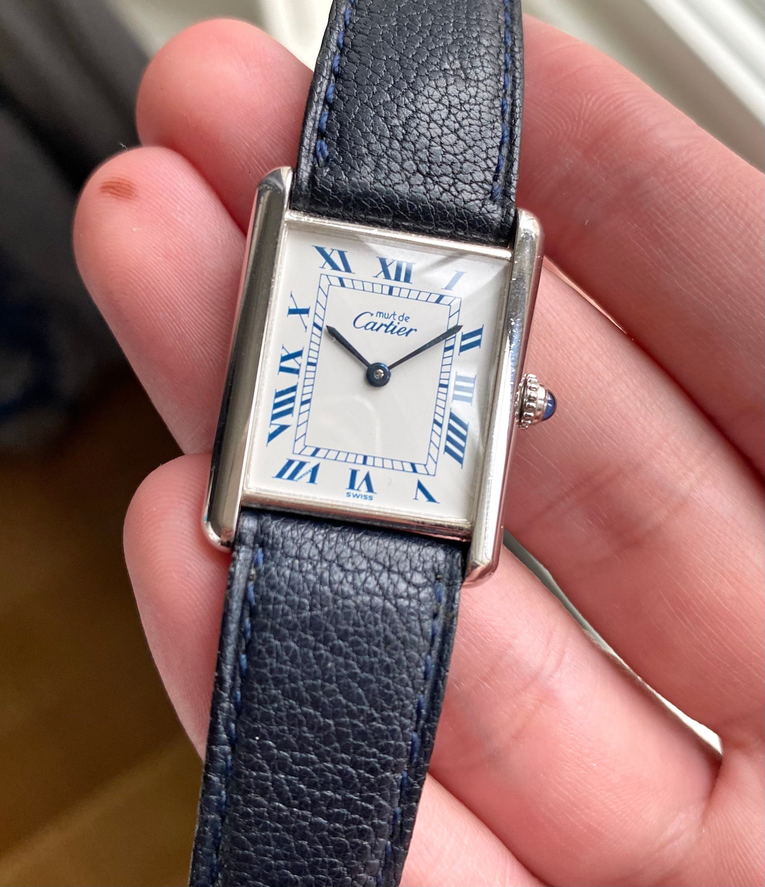 Cartier Tank — White Roman Numeral Dial