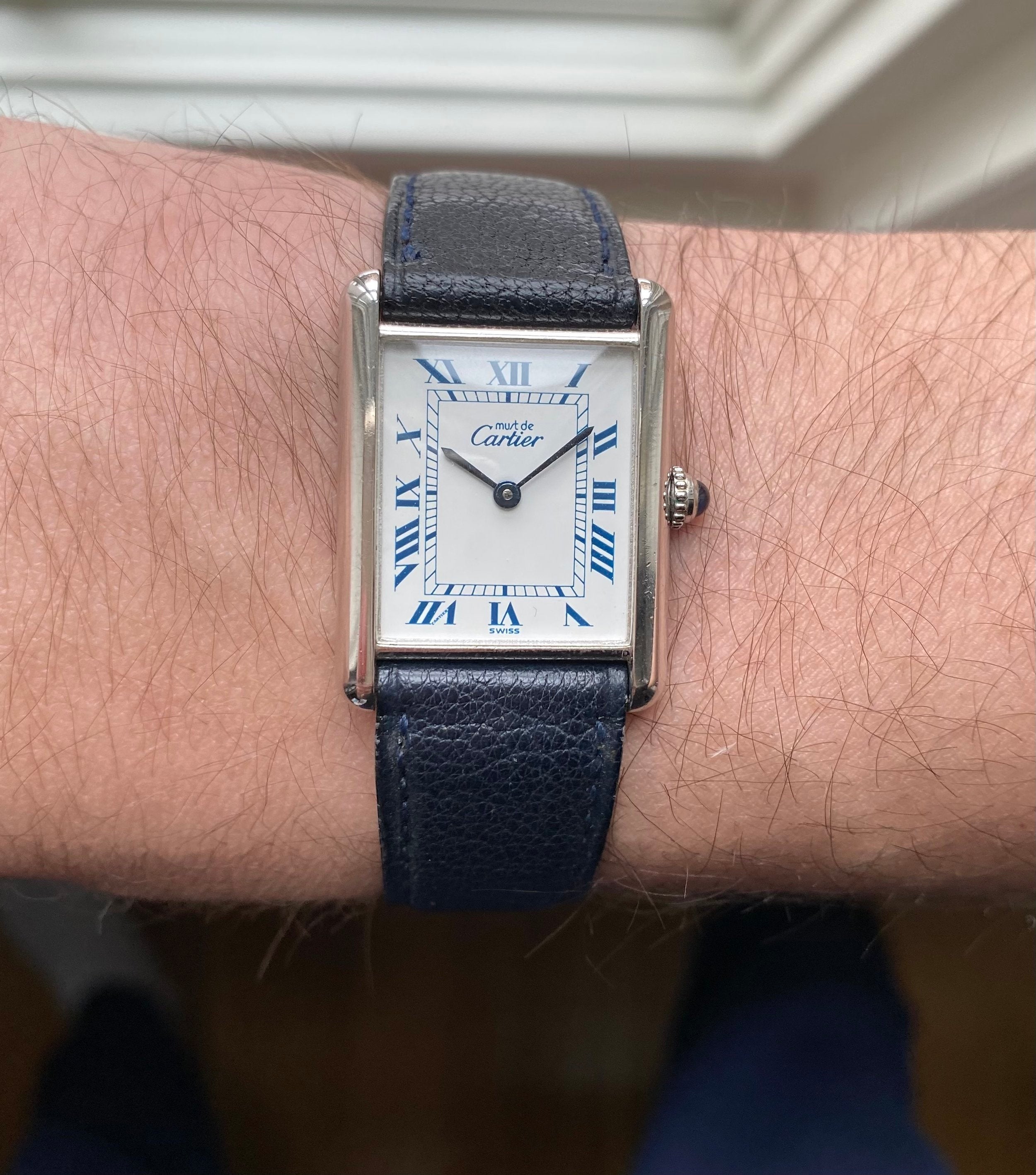 Cartier Tank — White Roman Numeral Dial