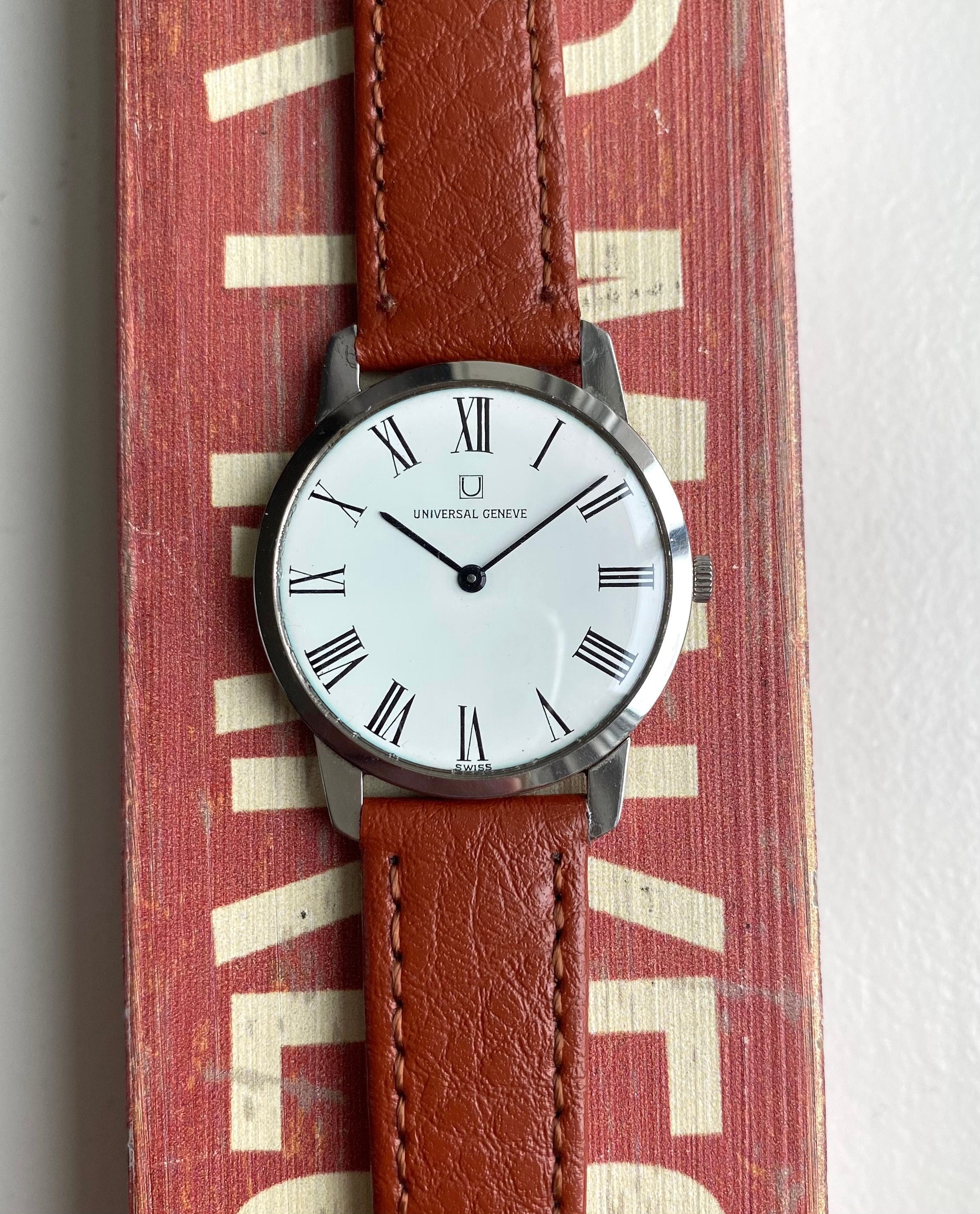 Vintage Universal Geneve Manual Wind White Roman Numeral Dial Steel Case Watch