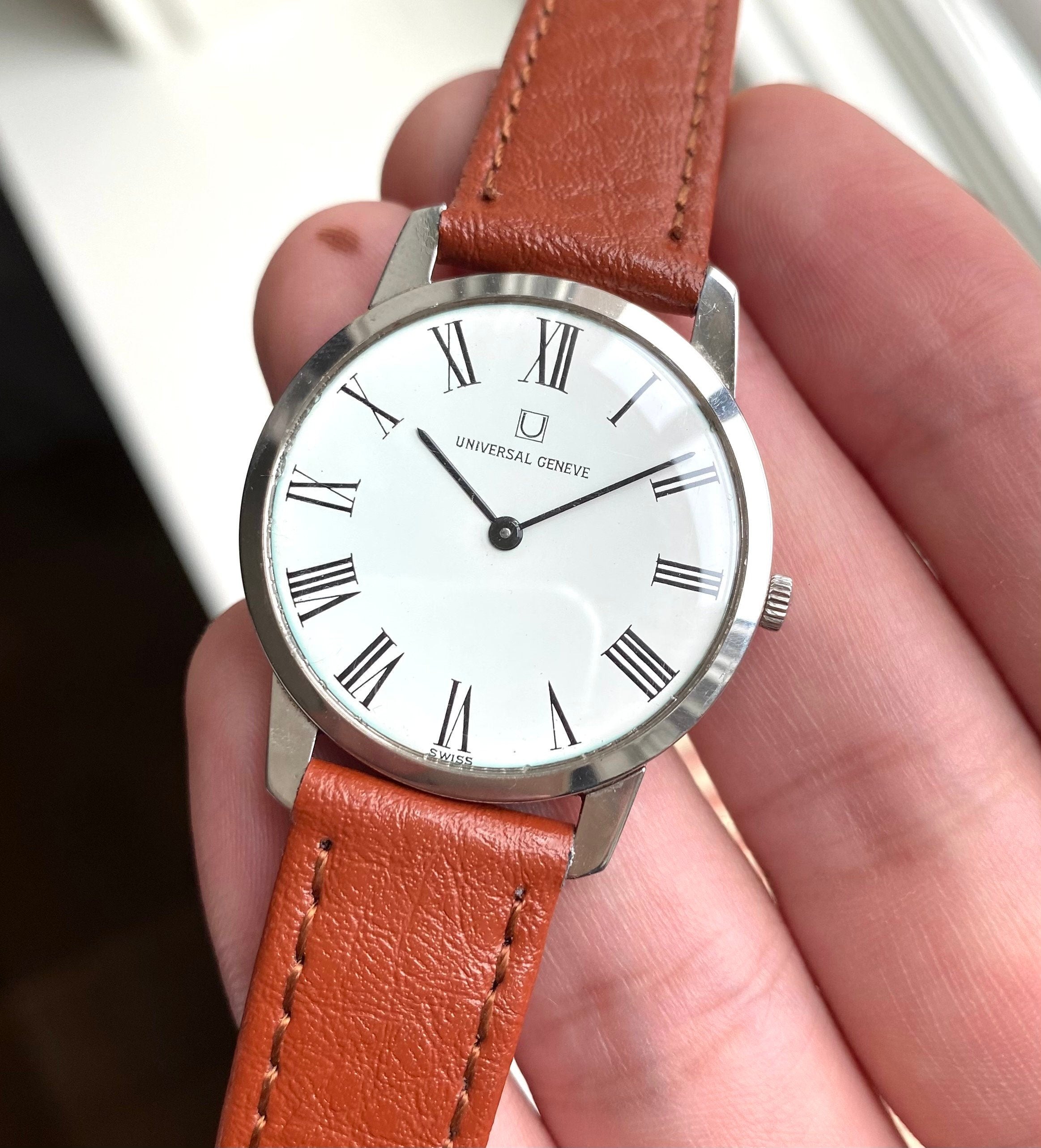 Vintage Universal Geneve Manual Wind White Roman Numeral Dial Steel Case Watch