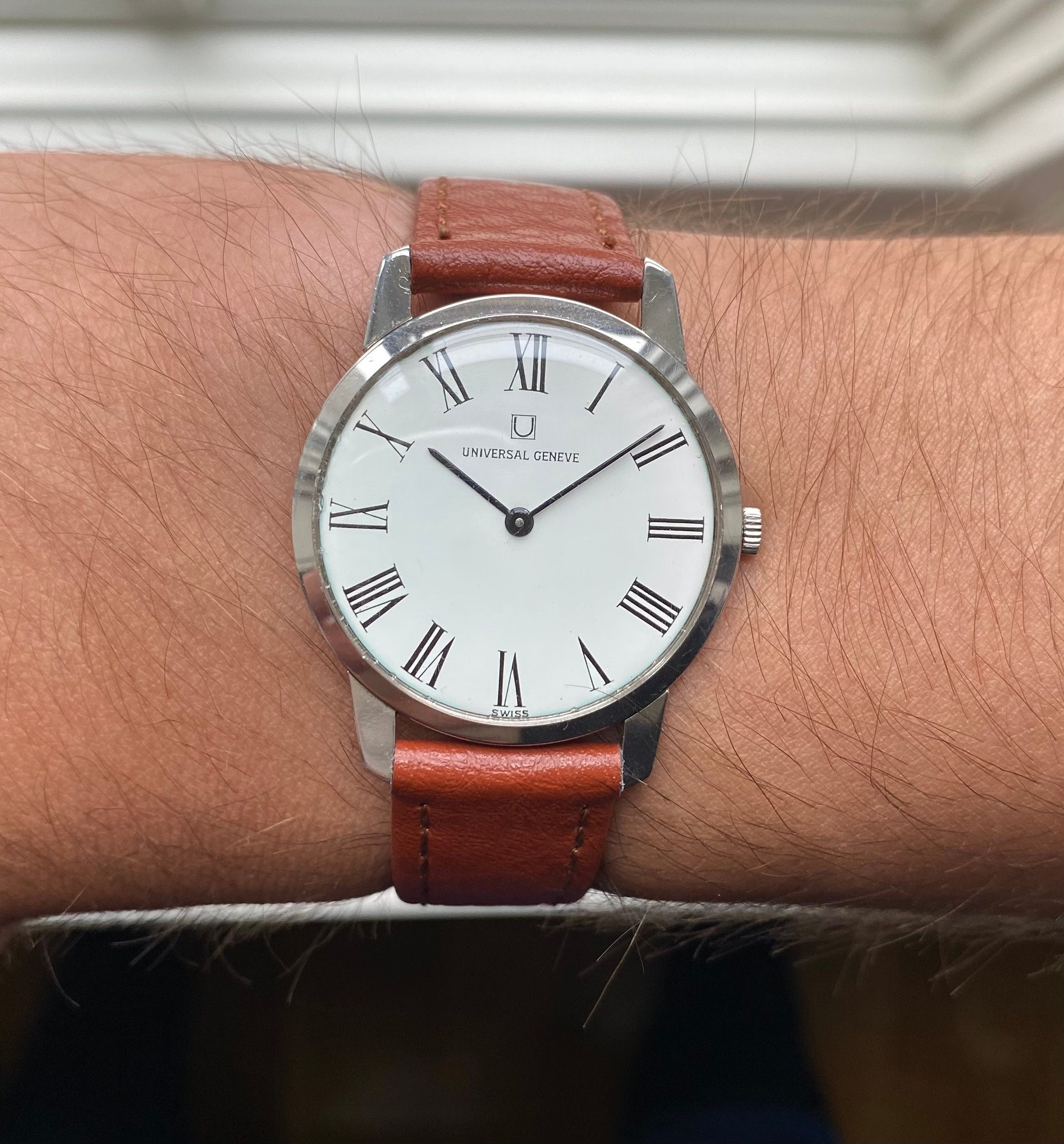 Vintage Universal Geneve Manual Wind White Roman Numeral Dial Steel Case Watch
