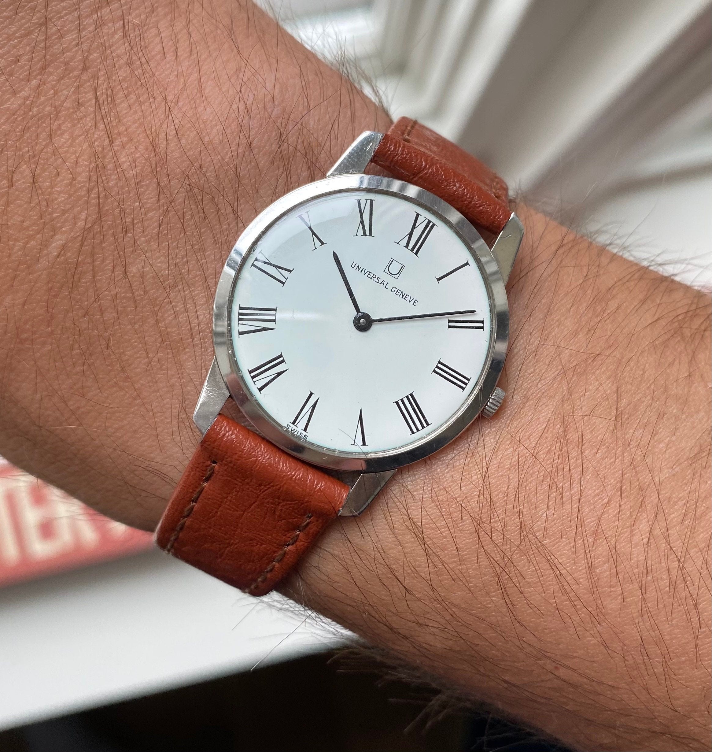 Vintage Universal Geneve Manual Wind White Roman Numeral Dial Steel Case Watch